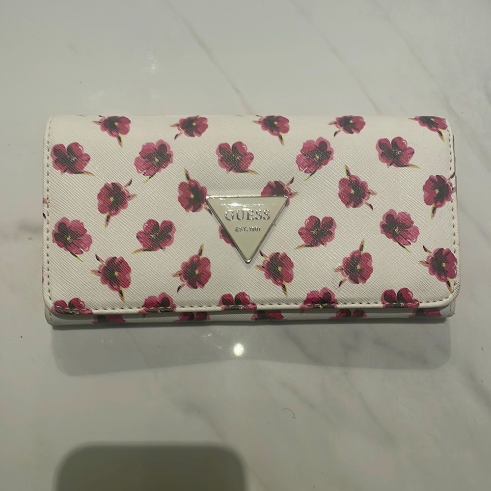 Guess - Wallet. Really cute. Brand new. Never Used. Received as a present.